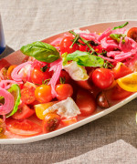 HEIRLOOM TOMATO SALAD WITH BUFFALO MOZZARELLA & CASHEW PESTO 